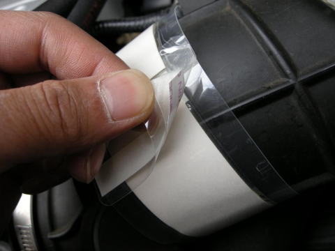 �c���������̗��ʃe�[�v���\��t����I